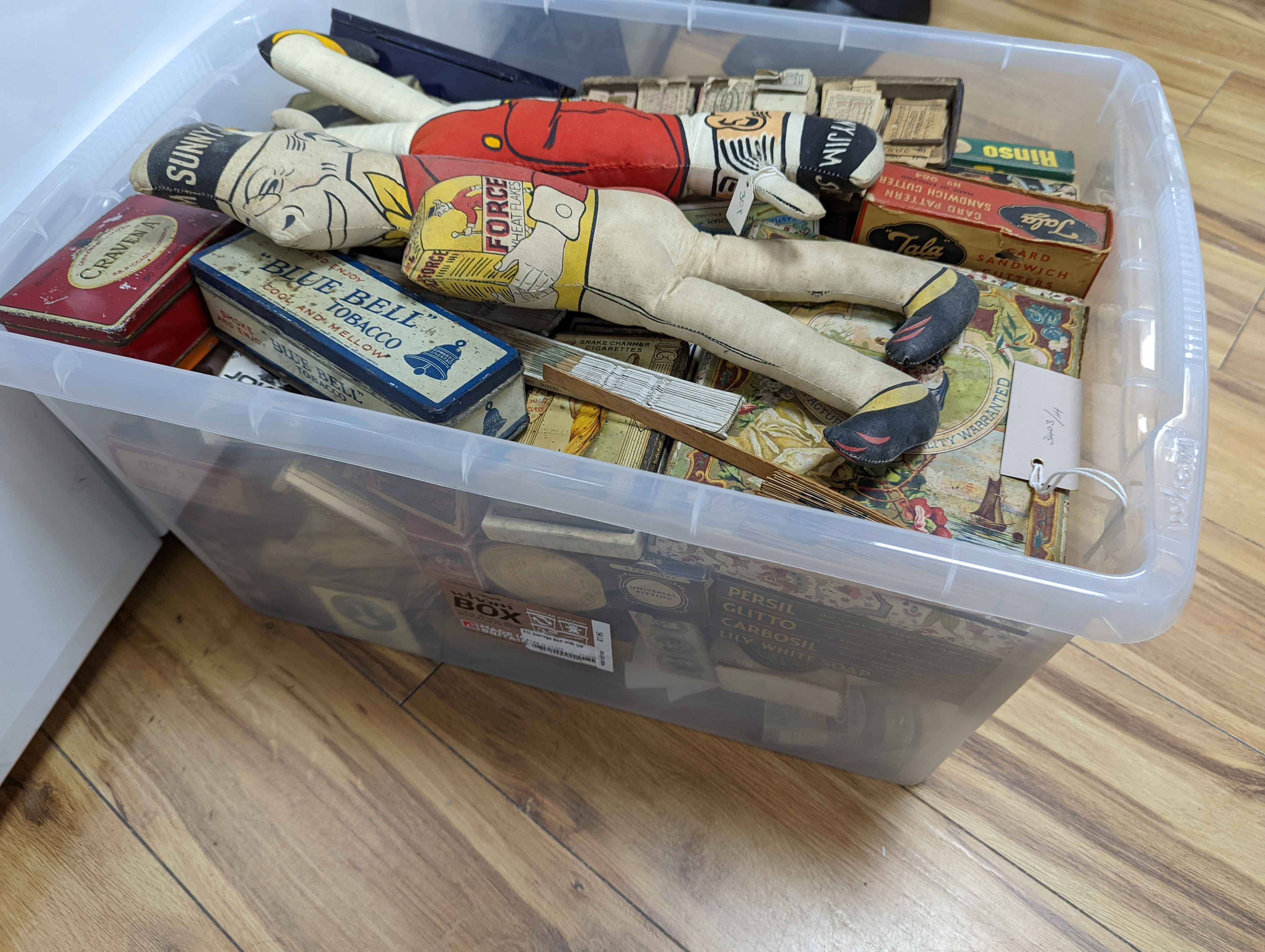 A large collection of advertising boxes, tins etc